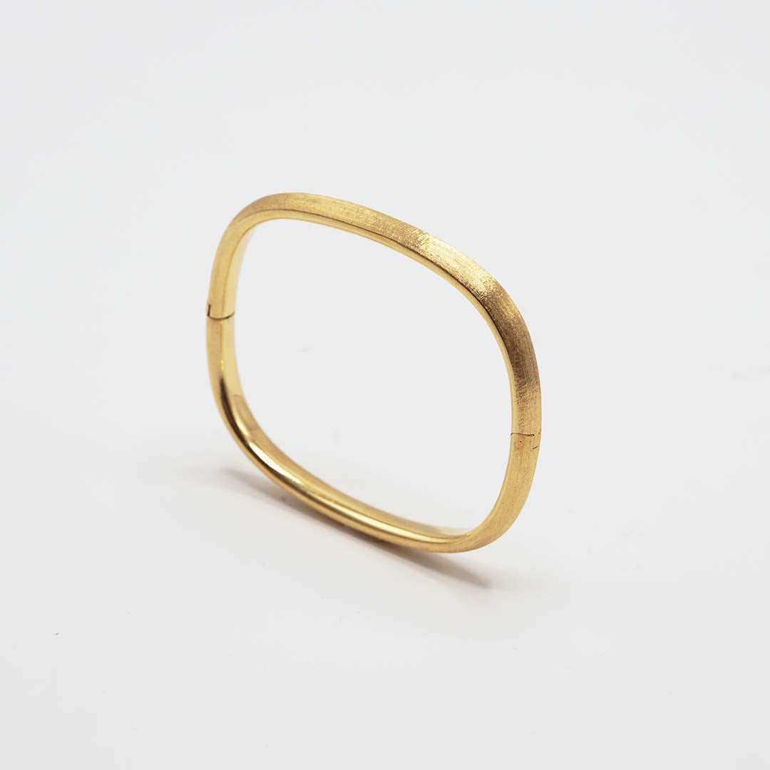 Textured gold bangle