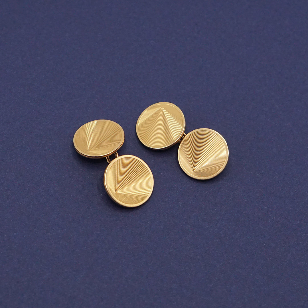 Circular gold cufflinks